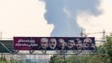 بیلبوردی در تهران از تصاویر شش تن از کسانی که در حمله بامداد جمعه کشته شدند