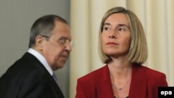 European Union foreign-affairs chief Federica Mogherini (right) and Russian Foreign Minister Sergei Lavrov attend a joint press conference in Moscow on April 24.