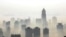 China -- An aerial view of buildings standing out amid haze engulfing Wuhan, central China's Hubei province, 03Dec2009