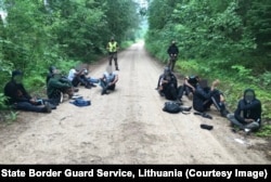 Men apprehended on a forest road near the Belarusian border on July 1.