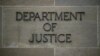 U.S. -- "Department of Justice" sign is seen on the wall of the US Department of Justice building in Washington, April 18, 2019