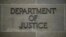 U.S. -- "Department of Justice" sign is seen on the wall of the US Department of Justice building in Washington, April 18, 2019