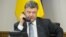 Ukrainian President Petro Poroshenko's office said the two leaders "noted the urgent necessity of establishing a complete cease-fire" in the region. (file photo)