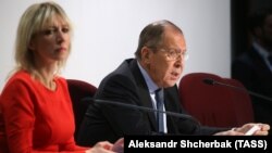 ITALY -- Russia's Foreign Minister Sergei Lavrov and Foreign Ministry spokeswoman Maria Zakharova at a press conference in Milan, December 7, 2018.