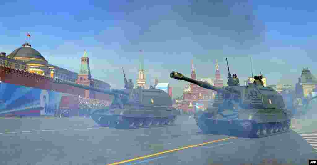 A column of Russian tanks drives through Moscow's Red Square during the Victory Day parade.