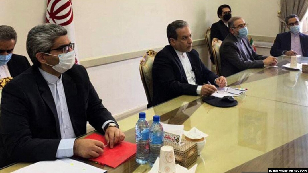 Iranian Deputy Foreign Minister Abbas Araqchi (center) attends a virtual meeting with the Joint Commission on Iran's nuclear program in Tehran on April 2.