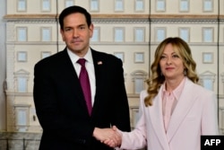 Italian Prime Minister Giorgia Meloni (right) welcomes US Secretary of State Marco Rubio at the Palazzo Chigi in Rome on May 8.