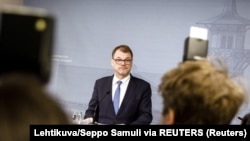 Премьер-министр Финляндии Юха Сипиля во время пресс-конференции 8 марта 2019 года