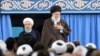 IRAN -- Iran's Supreme Leader Ayatollah Ali Khamenei and Iranian President Hasan Rohani (L) attend a ceremony in Tehran, April 14, 2018