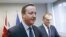 British Prime Minister David Cameron (L) and European Union President Donald Tusk meet before the EU summit in Brussels.