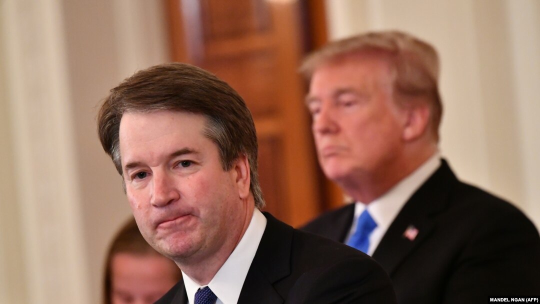 U.S. Supreme Court nominee Brett Kavanaugh (left) with U.S. President Donald Trump (right) in Washington