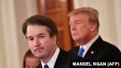 U.S. Supreme Court nominee Brett Kavanaugh (left) with U.S. President Donald Trump (right) in Washington