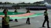 Turkmen servicemen march during a military parade marking the 25th anniversary of Turkmenistan's independence, in Ashgabat on October 27.