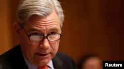 Democratic Senator Sheldon Whitehouse of Rhode Island is a co-sponsor of a sweeping bipartisan sanctions package targeting Russia and Iran that was set to come up for a vote on July 28. (file photo)