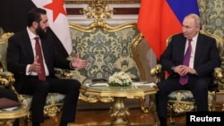 Ахмед аш-Шараа и Владимир Путин на встрече в Кремле, октябрь 2025 года
