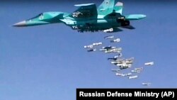 A Russian Su-34 unloads its bombs over a target in Syria. (file photo)