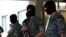 Armenia - Armed police officers guard the entrance to a hospital in Yerevan where opposition gunmen wounded by secrity forces are receiving medical aid, 29Jul2016.