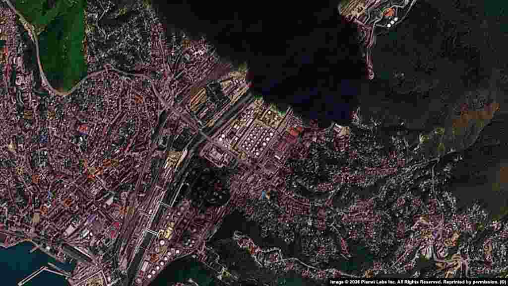 A fire (top right) burns at the Tuapse oil refinery on April 28. Damage from earlier Ukrainian drone strikes on the facility can be seen at lower left of the image. 