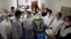 Clerics visiting coronavirus patients in Tehran. Undated