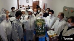 Clerics visiting coronavirus patients in Tehran. Undated