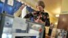 A woman casts her ballot in the eastern Ukrainian city of Donetsk in the May 11 referendum called by pro-Russian separatists.