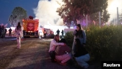 ხანძარი ირანის სარაკეტო იერიშის შედეგად. ცენტრალური ისრაელი, 13 მარტი, 2016.