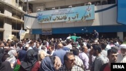 Abadanis demonstrating in front of the local water department because of water salinity.