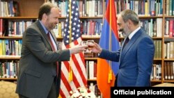 Armenia - Prime Minister Nikol Pashinian (R) visits the U.S. Embassy in Yerevan to congratulate Ambassador Richard Mills on U.S. Independence Day, 3 July 2018.