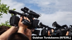 Kyrgyzstan - journalist - journalists - camera - cameraman - media - 