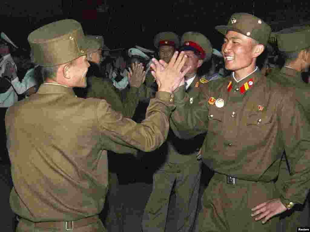 North Korean soldiers attend festivities in central Pyongyang to celebrate North Korean leader Kim Jong Il's reelection as general secretary of the Workers' Party of Korea. Official North Korean KCNA photo provided by Reuters