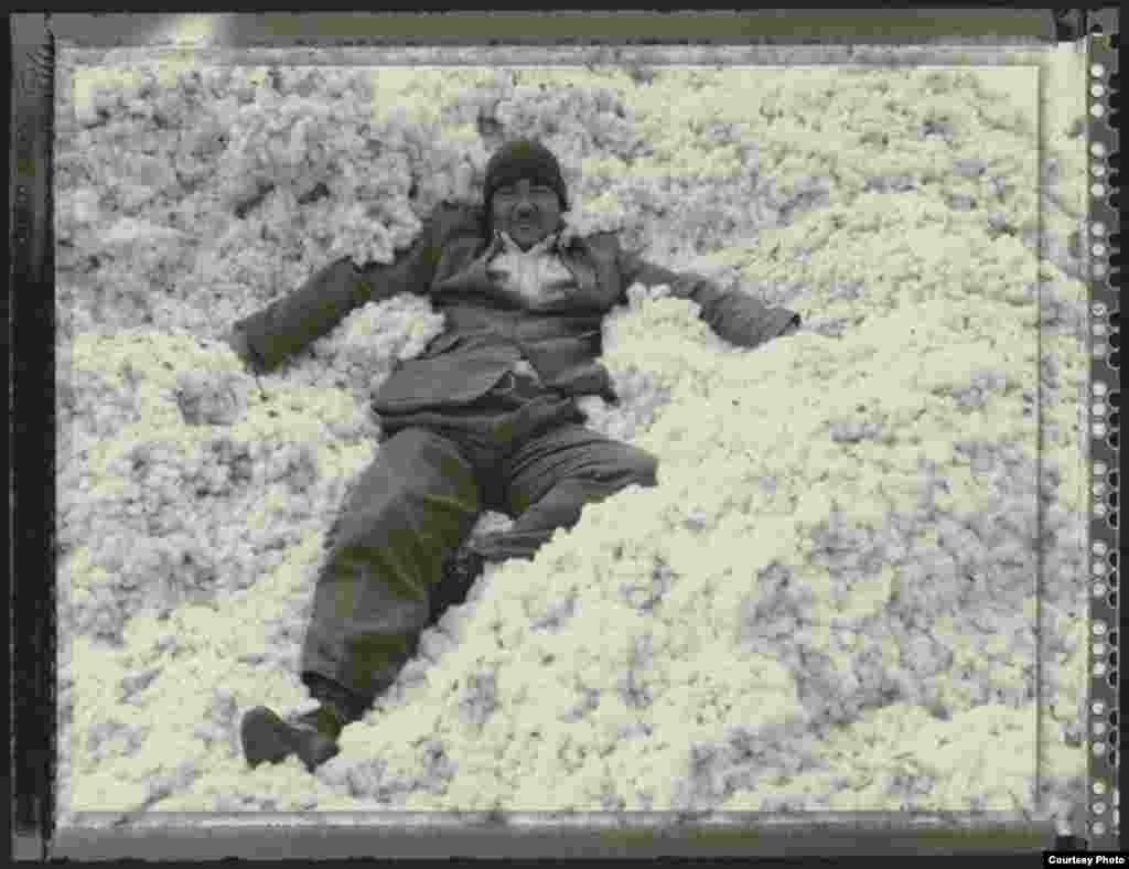 A man reclines on a pile of freshly harvested cotton - Soviet central planners in the 1960s decided to divert two of the main rivers feeding the Aral Sea: the Amu-darya and the Sir-darya. Uzbekistan became one of the world's biggest cotton producers as a result (all photos copyright Radek Skrivanek-www.radekphoto.com)