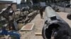 A member of the Israeli military walks past an Iranian ballistic missile which fell in Israel on the weekend, during a media tour at the Julis military base near the southern Israeli city of Kiryat Malachi (file photo)