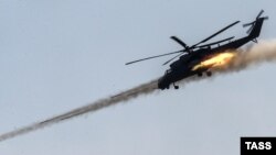 Ми-35 русумидаги Россия вертолëти.
