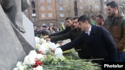 Armenia - People in Gyumri lay flowers at a memorial to victims of the 1988 earthquake, December 7, 2018.