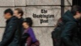 Ljudi prolaze pored zgrade One Franklin Square, kuće novina The Washington Post, u središtu Washingtona, 21. februar 2019. 