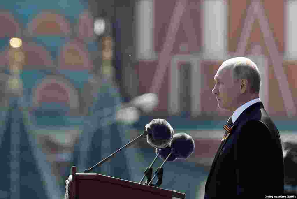 Russian President Vladimir Putin addresses troops at the parade. The event falls ahead of a July 1 national vote on controversial amendments to the Russian Constitution that could allow Putin to stay in power until 2036.