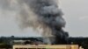 Smoke rises from the Westgate mall in Nairobi on September 23. Militants are continuing to hold an unknown number of hostages there.