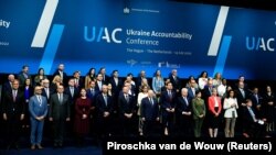 Учасники Конференції Ukraine Accountability Conference щодо воєнних злочинів під час вторгнення Росії до України. Гаага, Нідерланди, 14 липня 2022 року