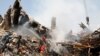 Rescue workers and fire fighters work at the site of the collapsed iconic Plasco building in Tehran, Iran, 20 January 2017. File photo