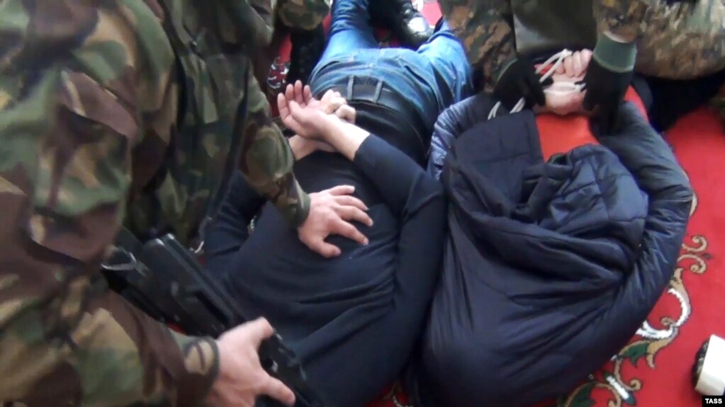 A photo released by the public relations center of the Russian security services showing the arrest of alleged Islamic State extremists in Daghestan. (file image)