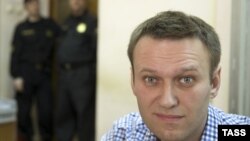 Лидер оппозиции и активный блогер Алексей Навальный. Москва, 7 марта 2014 года.