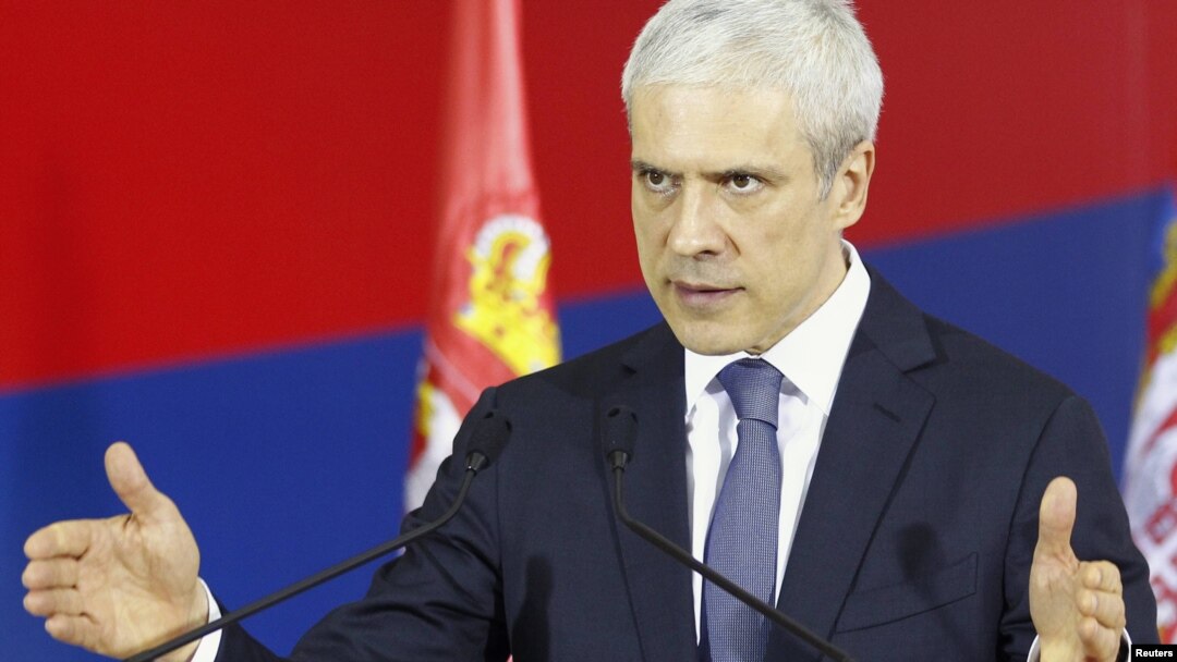 Serbian President Boris Tadic gestures during a news conference in Belgrade on December 30.