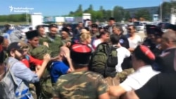 Russian Opposition Leader And Supporters Attacked By Cossacks