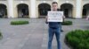 A protester demonstrates in support of journalists in St. Petersburg on July 7.