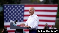 U.S. -- Democratic presidential candidate former Vice President Joe Biden speaks at a drive-in rally at Cellairis Amphitheatre in Atlanta, Tuesday, Oct. 27, 2020.