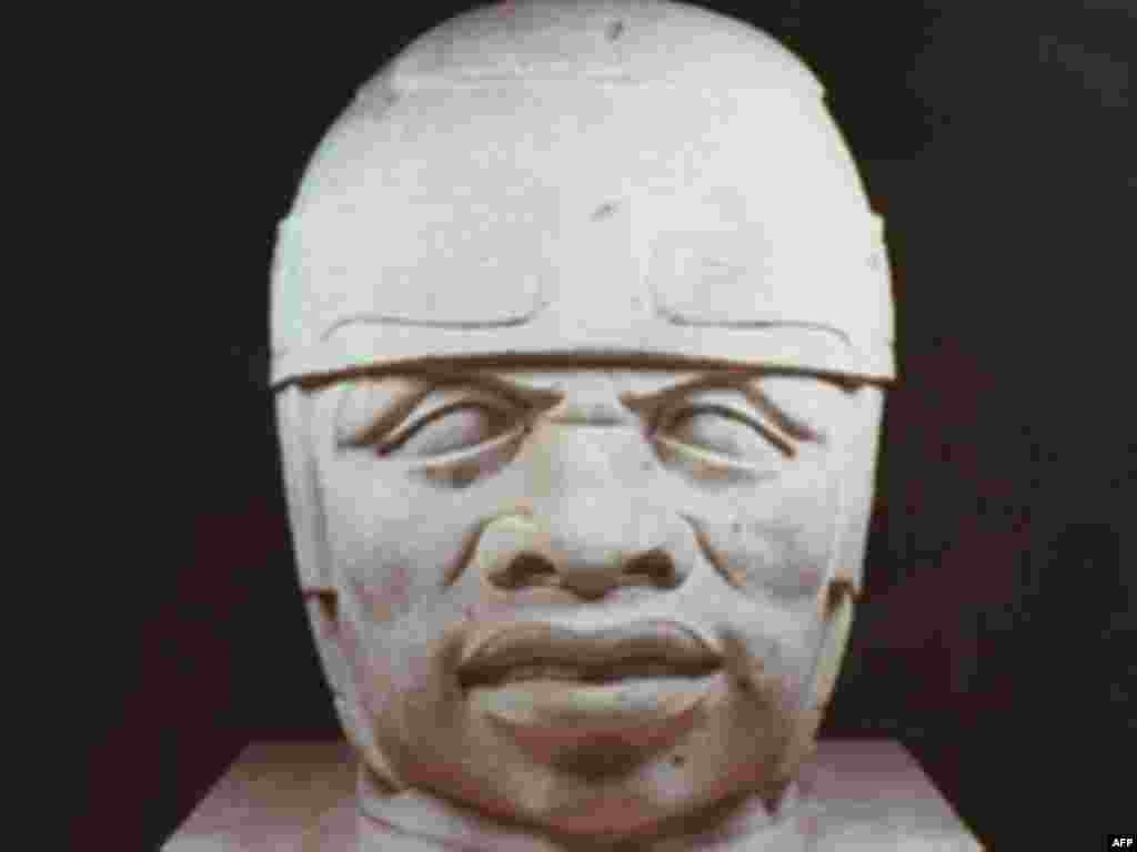 Mexico - This San Lorenzo Monument 8-Colossal Head from the early formative period is part of the Olmec Art of Ancient Mexico exhibition, 15Apr1996