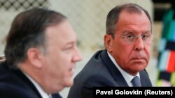 Mike Pompeo și Serghei Lavrov