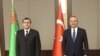 Türkmenistanyň daşary işler ministri Reşit Meredow we onuň türk kärdeşi Mewlüt Çawuşoglu. Arhiw suraty