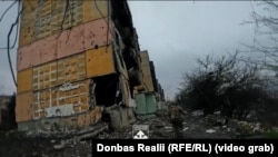 Бійці бригади НГУ «Хартія» зачищають будинок у центрі Куп'янська