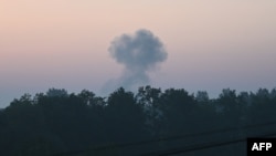 A cloud of smoke after a night drone strike in the western Ukrainian city of Lviv on June 20.